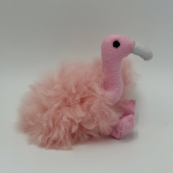 Little Pink flamingo plush toy on a white background